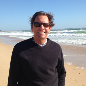 Simon Hudson standing on beach in Portugal
