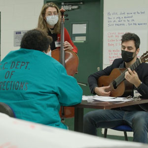 School of Music faculty work with mother to write a lullaby.