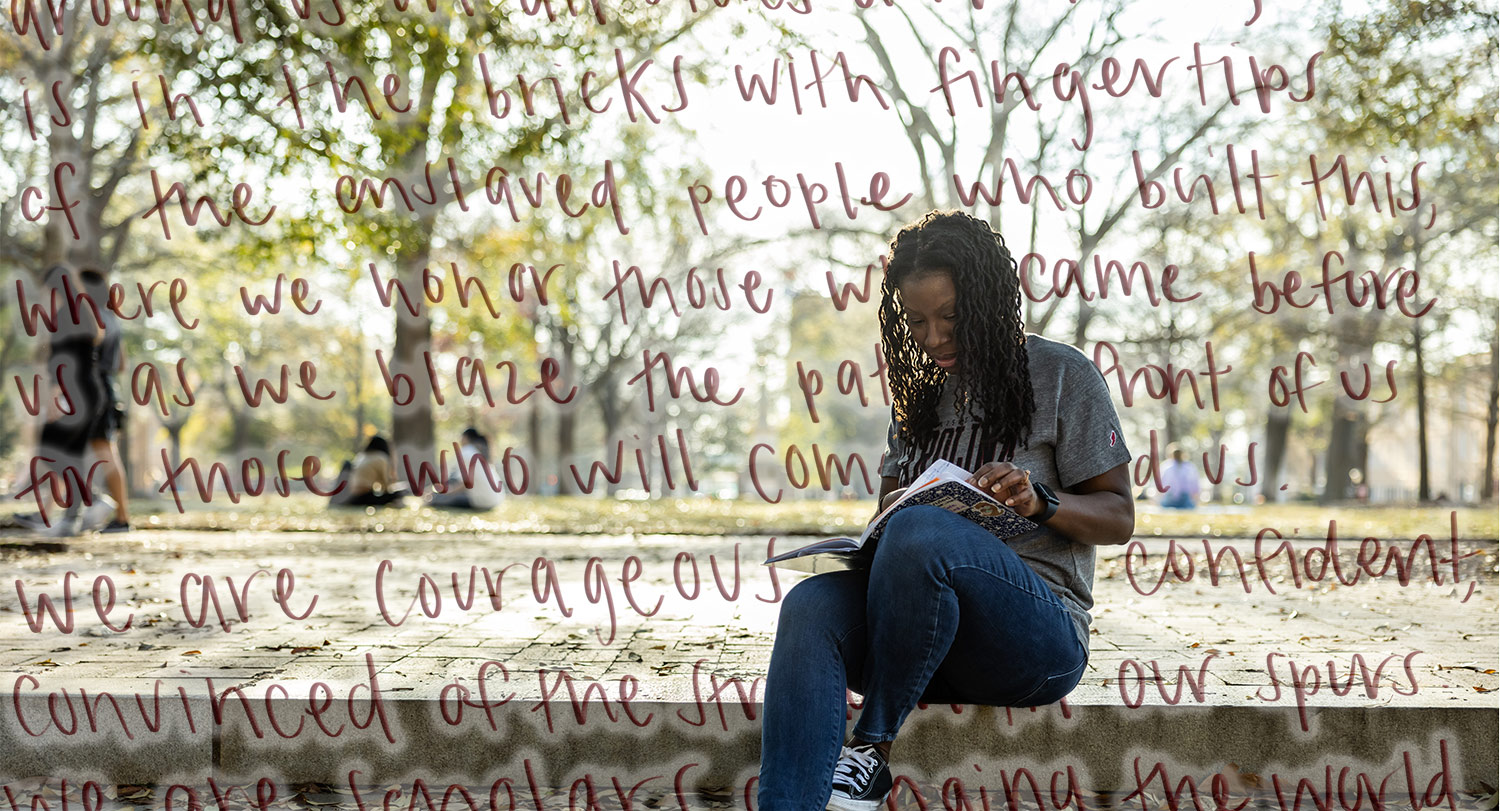 Jennifer Bartell Boykin sits on the Horseshoe to write a poem.