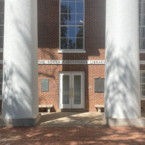 brick building with large white columns