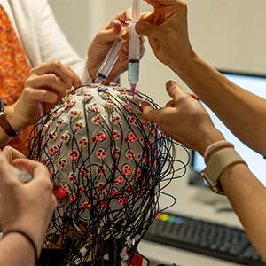 Brain research shows wires attached to a study participant's head