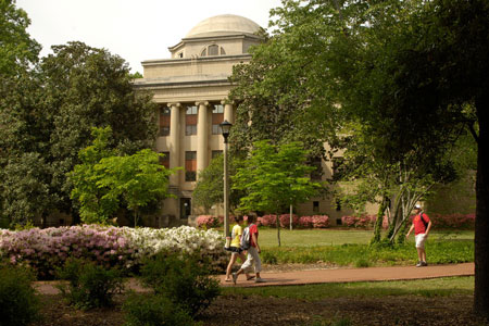 students walking on campus in front of McKissick Museum