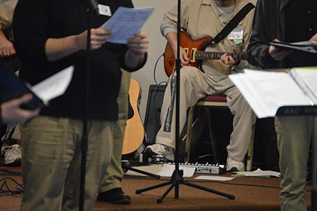 Inmates playing music at concert