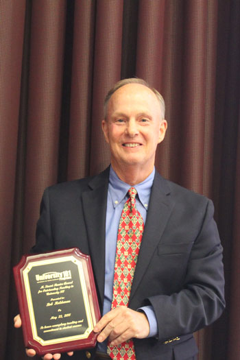 Bob Holdeman with the M. Stuart Hunter Award