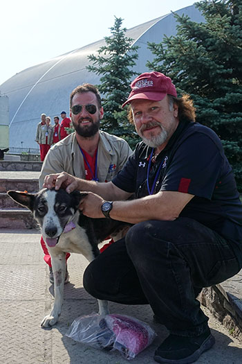 Tim Mousseau with dog at Chernobyl