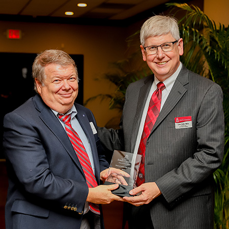 McElmurray and Dean Les Hall