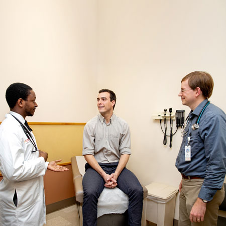 Drs. Patterson and Shaffer with a patient 