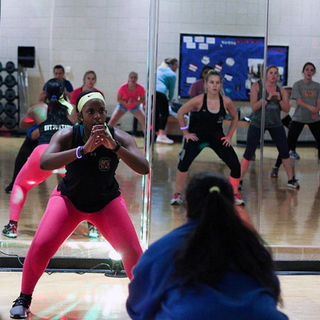 Elizabeth Thompson leads a group exercise class