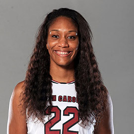 A'ja Wilson, wearing her Gamecock uniform, smiles at the camera