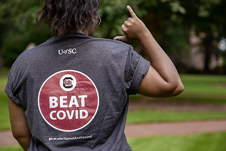 T-shirt that reads Beat COVID