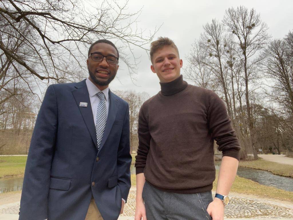 Johnson visits with an exchange student his family hosted in 2017