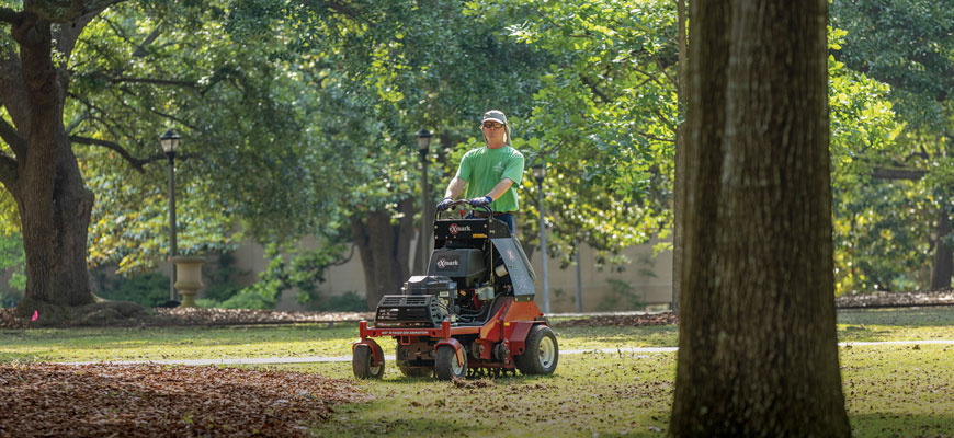 Norman Stewart, Assistant director, Landscaping Waste and Recycling aerates the lawn on the USC Horseshoe.