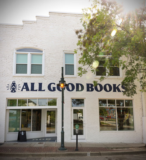 The front facade of the building that houses All Good Books.