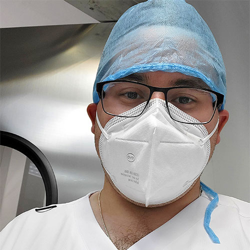 Portrait of  Robbie Pokora in a surgical mask