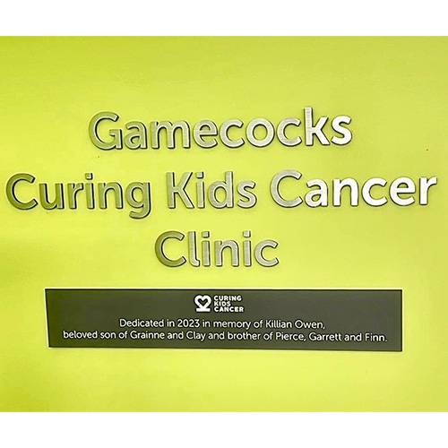 Sign saying Gamecocks Curing Kids Cancer Clinic