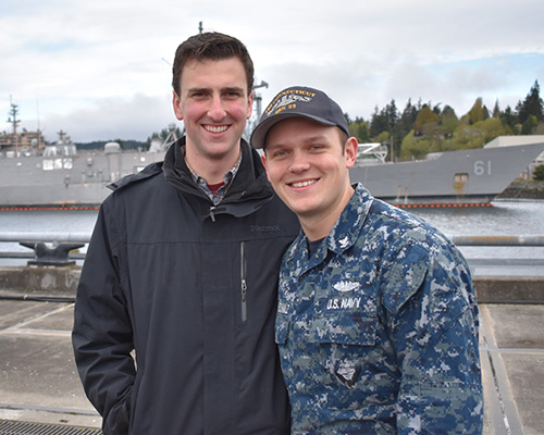 Noah Raganschmalz in Navy uniform posing with another person. 
