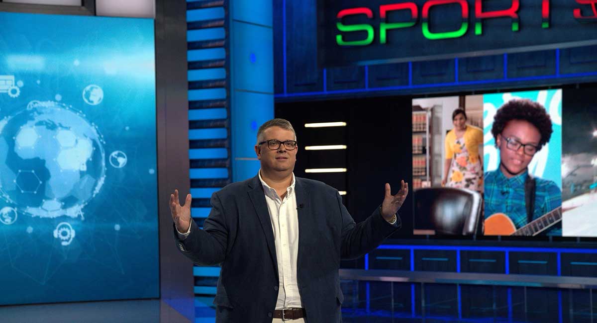 USC alumnus Aaron LaBerge stands on the set of ESPN's sportscenter