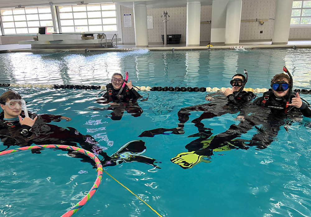 a group of USC students in scuba gear in Blatt pool