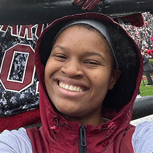 Kennedy Williams in the rain at a football game.