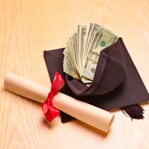 A graduation cap with cash stuffed inside. 