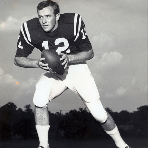 historic image of a football player with the number 12 on his jersey