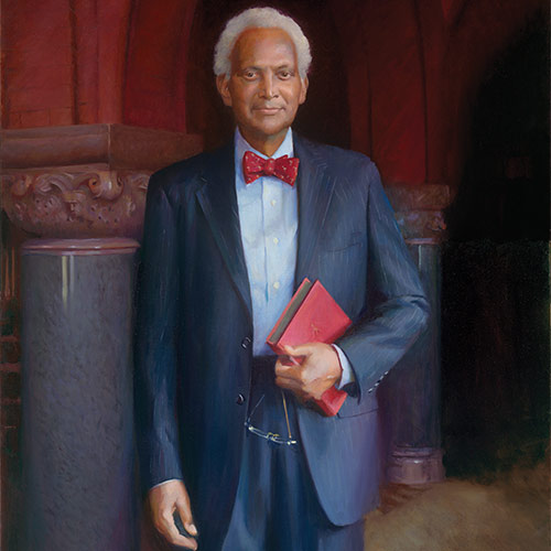 portrait of James Bowers holding a book