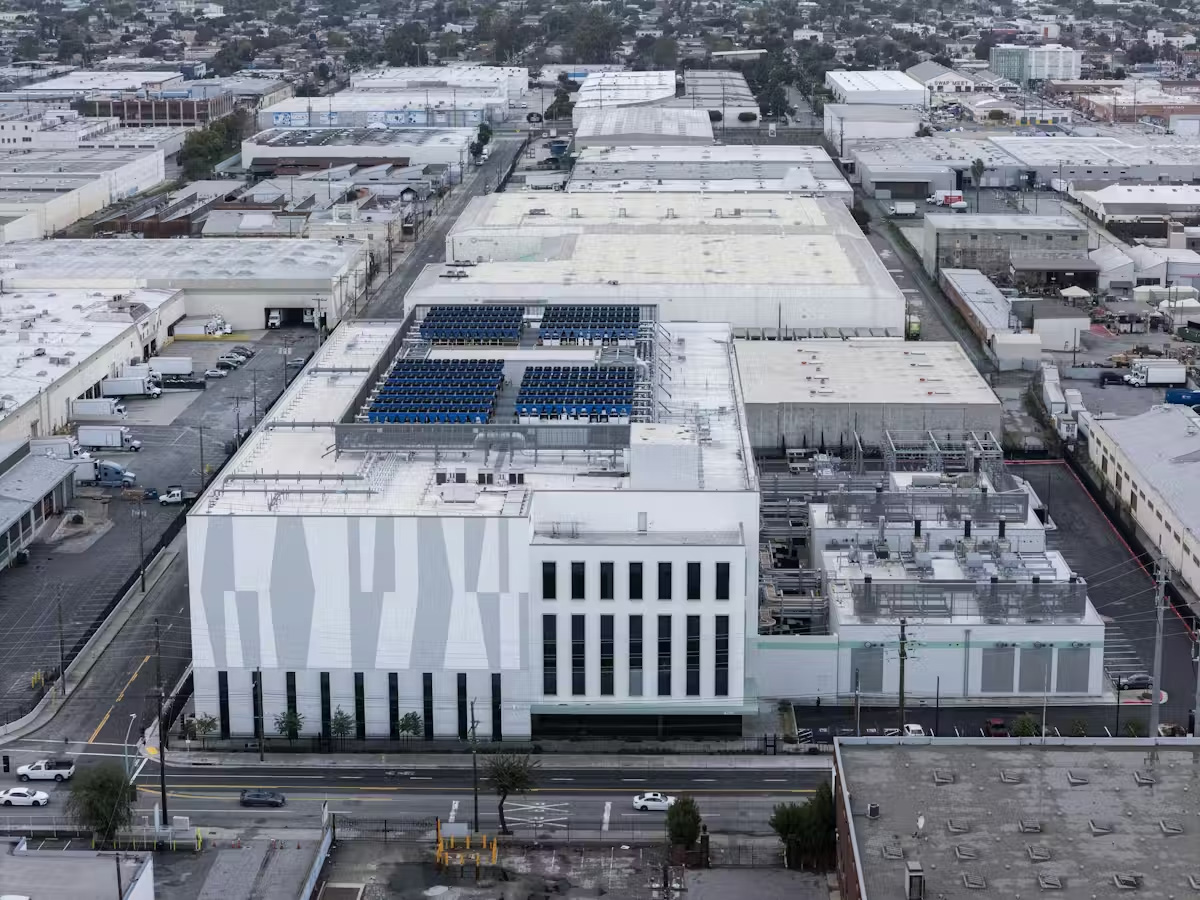 A large building amid a group of other large buildings.&nbsp;