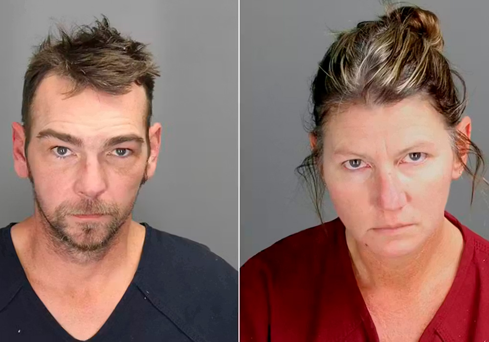 Color police mug shots of faces of a white man and white woman 