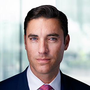 Headshot of a man in professional attire