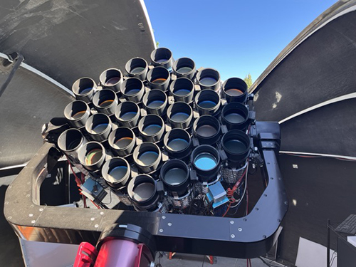 cluster of lenses positioned on a large telescope