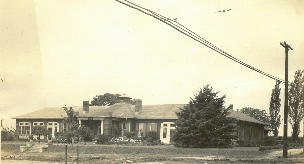 The Thomson infirmary on USC's campus sits at the intersection of Bull and Greene streets in a sepia-tinged vintage photo.