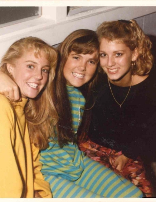 Carrie Morey, center, smiles in a picture from 1991 with her sorority sisters. 