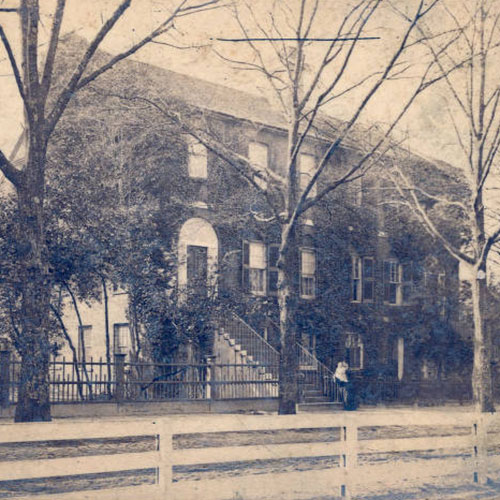 A black and white photograph of the Lieber College facade
