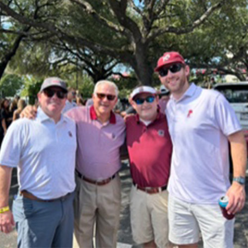 Four members of the Hungerpiller family stand outdoors