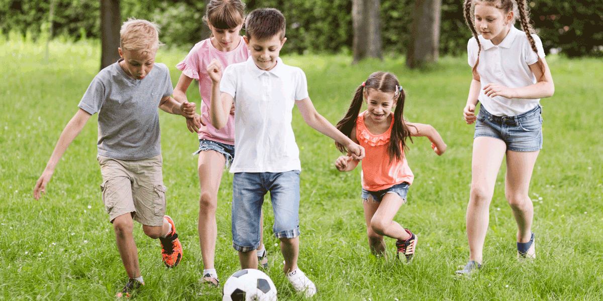 Children playing soccer.